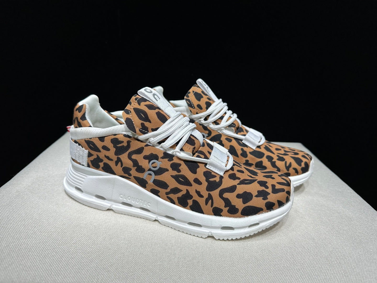 Women's leopard sneaker showing the breathable mesh upper and laces