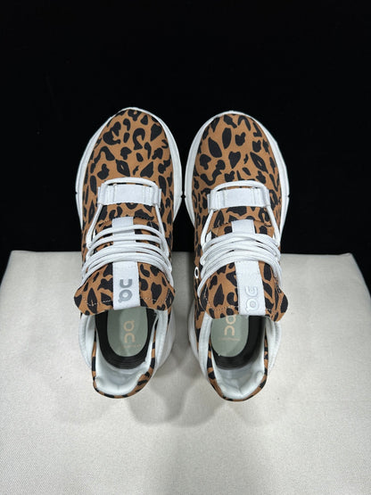 Close view of the leopard-print upper and cushioned sneaker construction